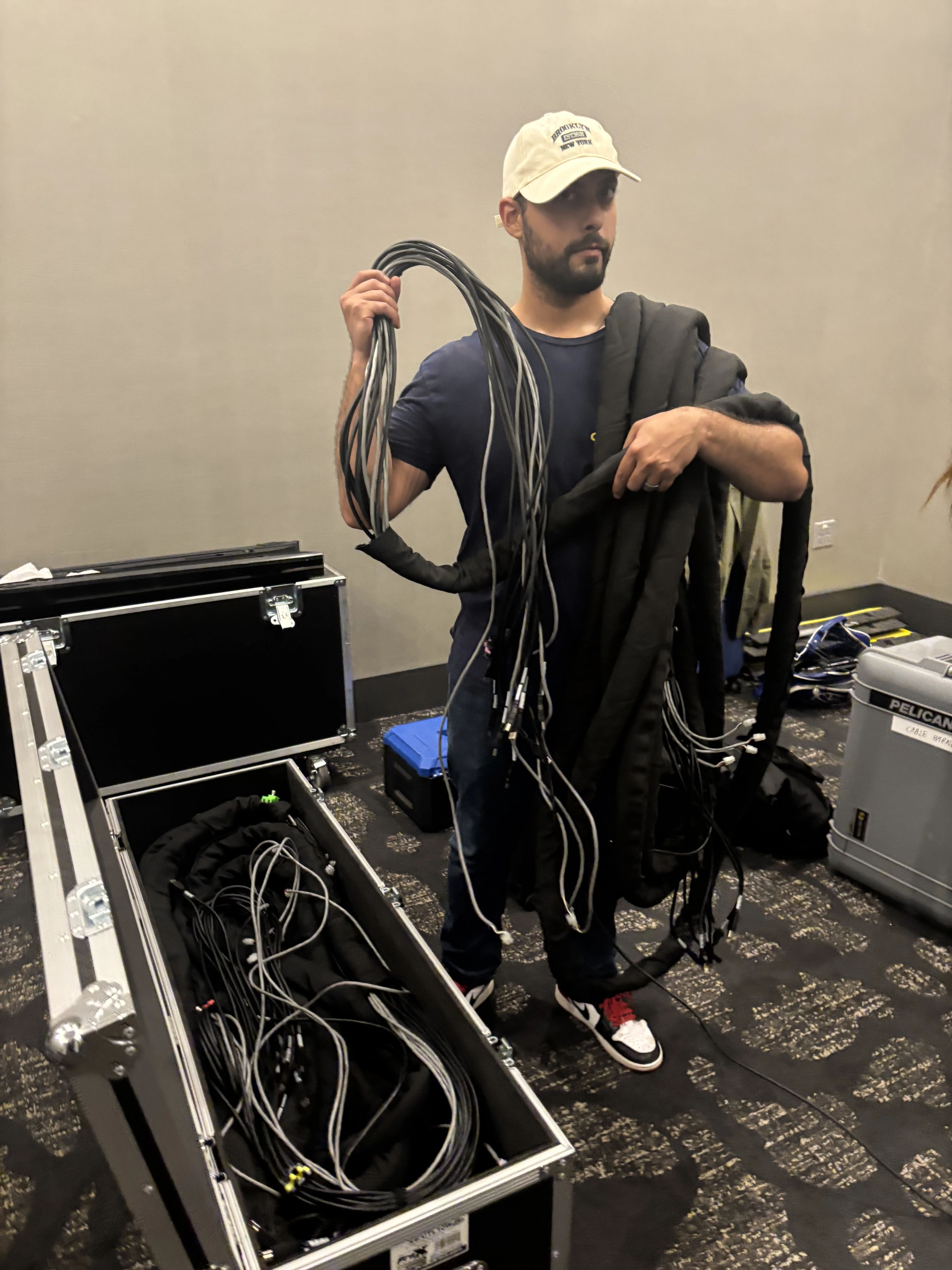 OpalOps IT technician coiling event network cabling